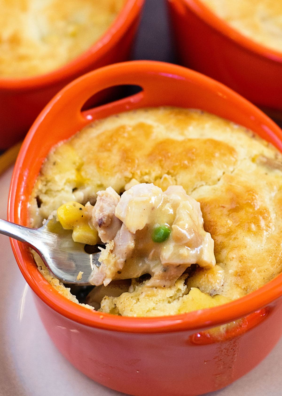 spoonful of Mini chicken pot pie with creamy chicken filling