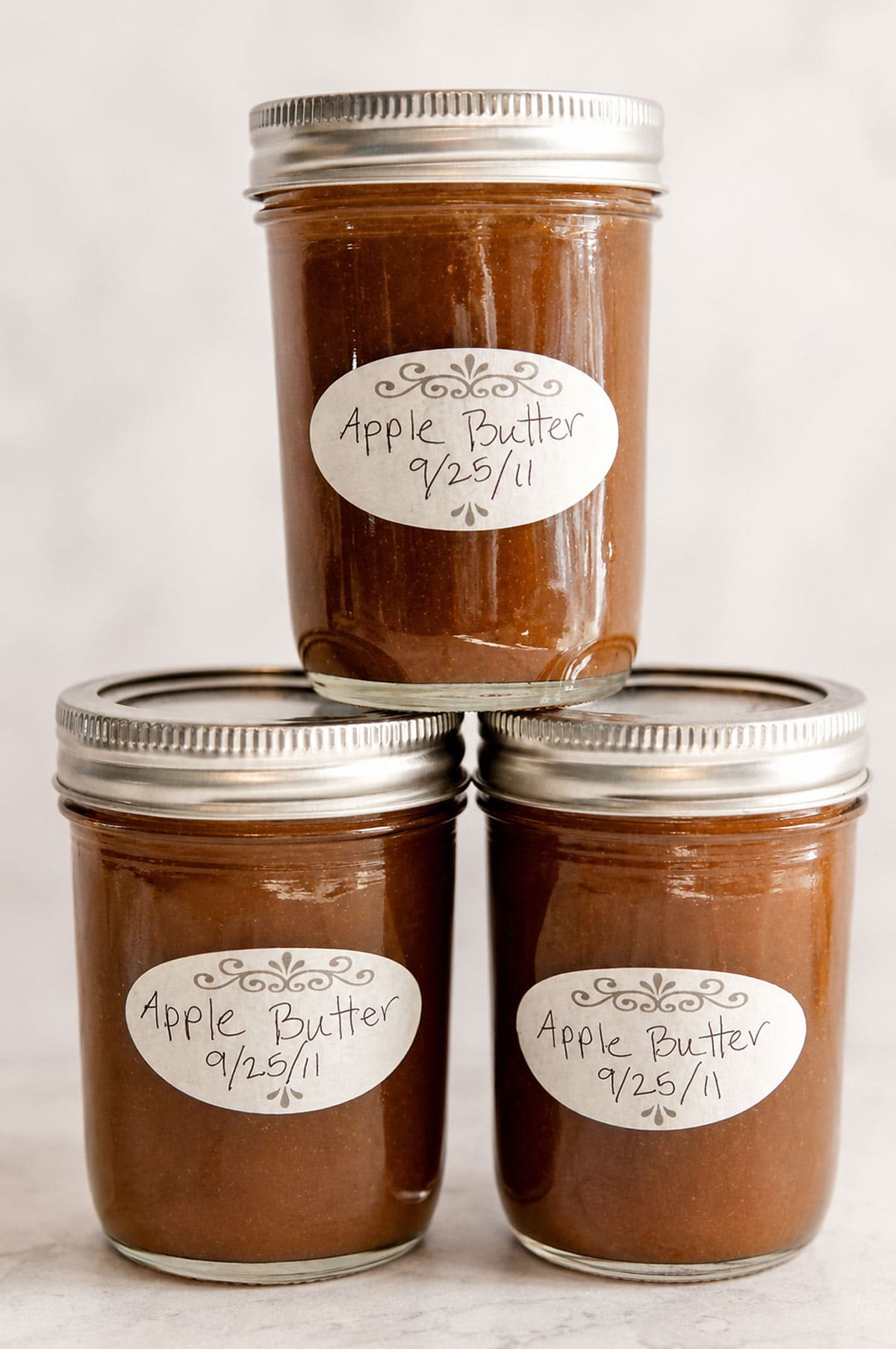 how to make homemade apple butter and can it too with this apple butter recipe and canning instructions! (Shortcut blender version.)