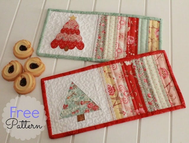 Two quilted Christmas mug rugs with festive appliqué designs