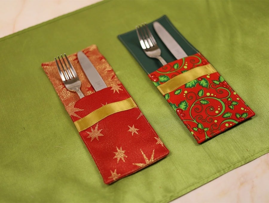 Fabric Christmas cutlery holders sewn in coordinating holiday prints