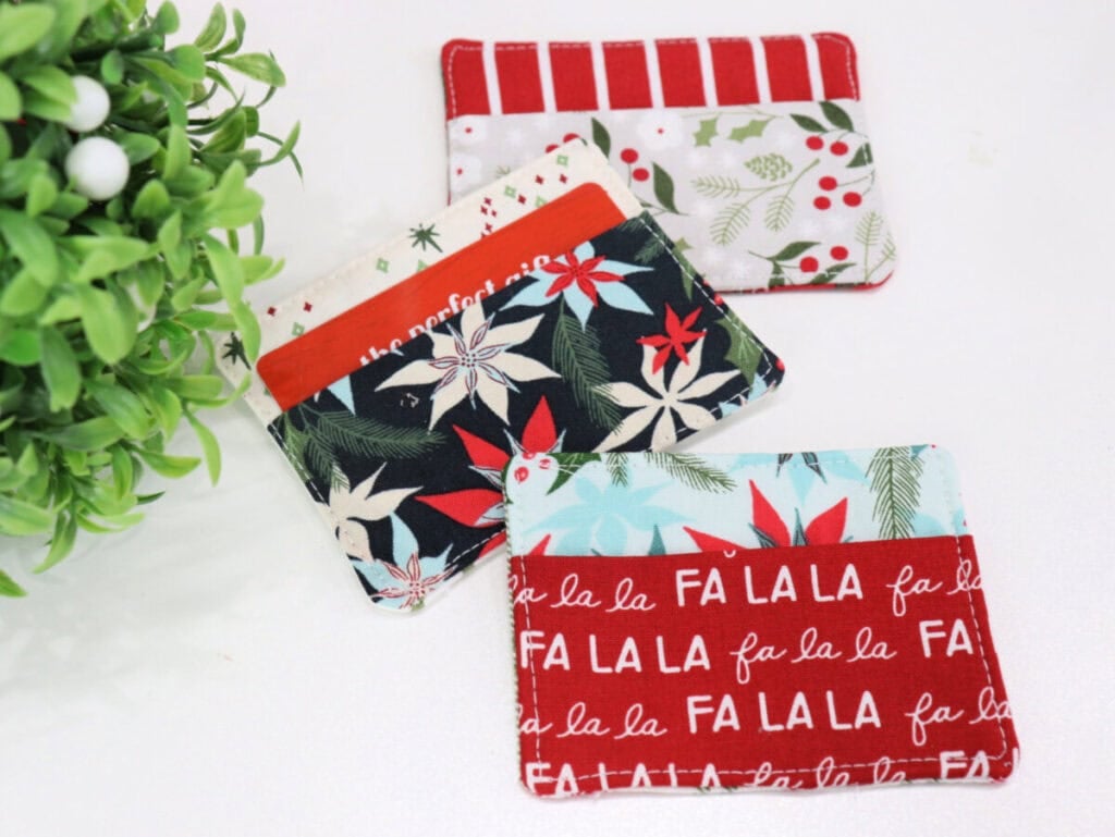 Small fabric gift-card holder sewn from Christmas fabric
