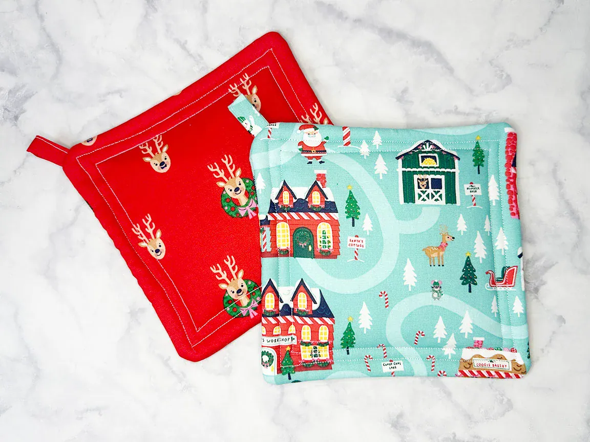 Easy square Christmas potholder sewn from festive holiday fabric