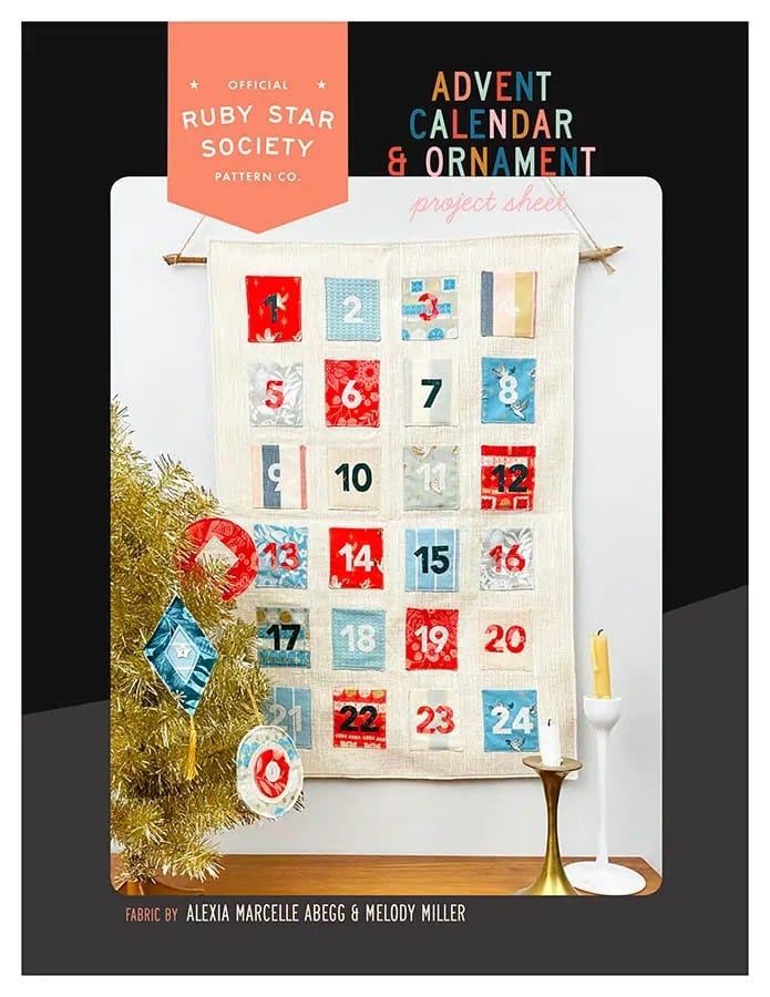 Fabric Advent calendar with numbered pockets and hanging ornaments