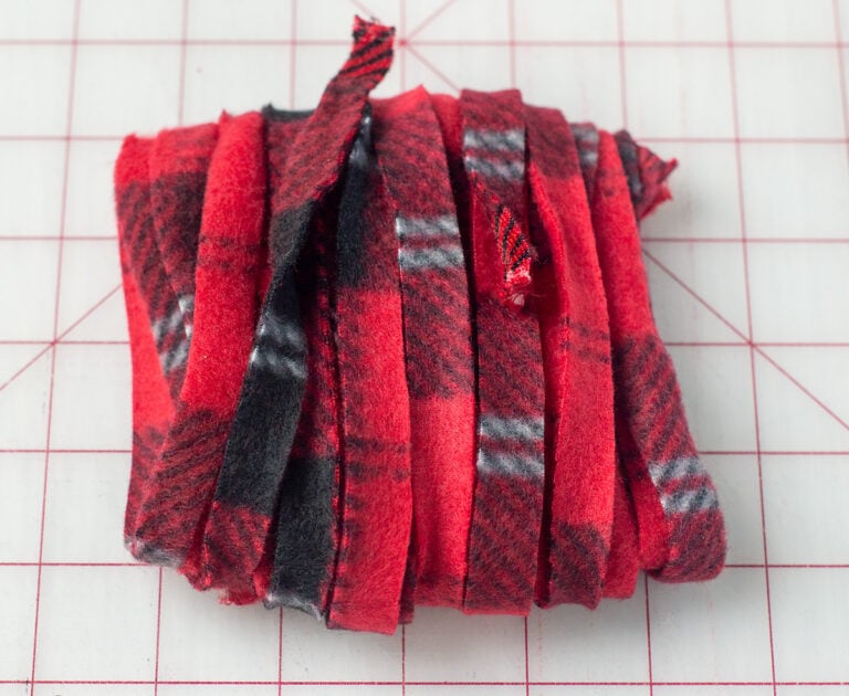 How to Make Fleece Pom Poms Scattered Thoughts of a Crafty Mom by Jamie Sanders