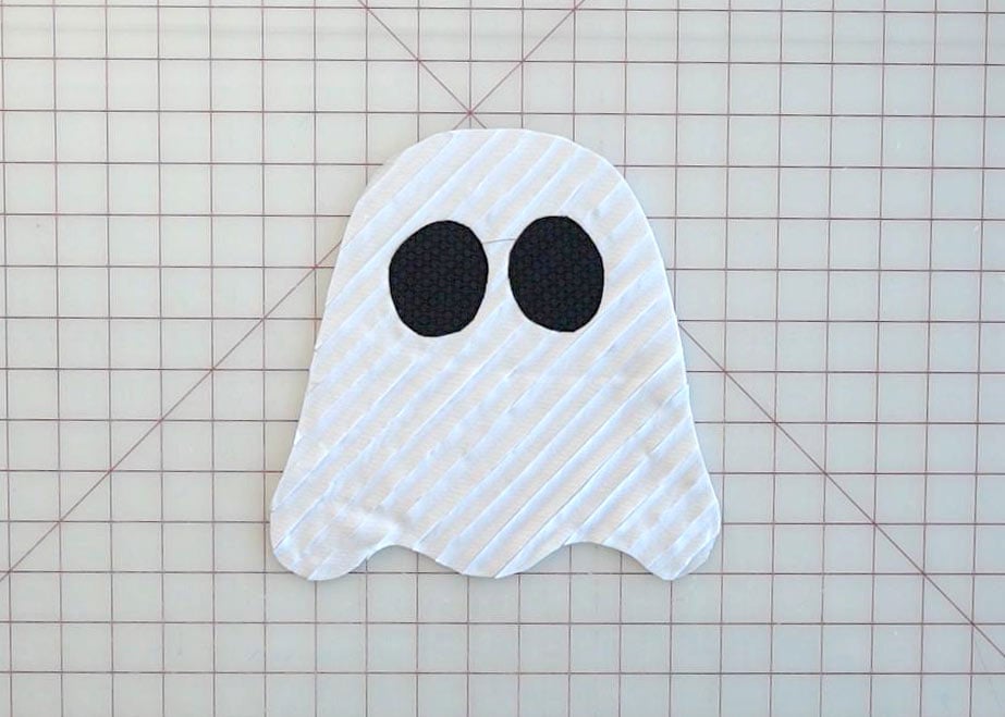 Finished textured ghost appliqué with black eyes