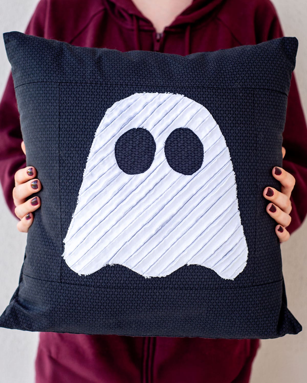 Finished textured ghost pillow with white chenille-style ghost appliqué