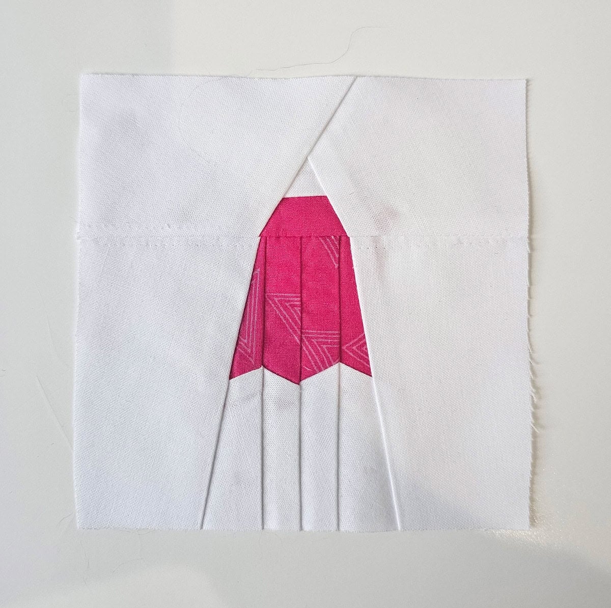 Mini ghost foundation paper piecing quilt block with pink and white fabric